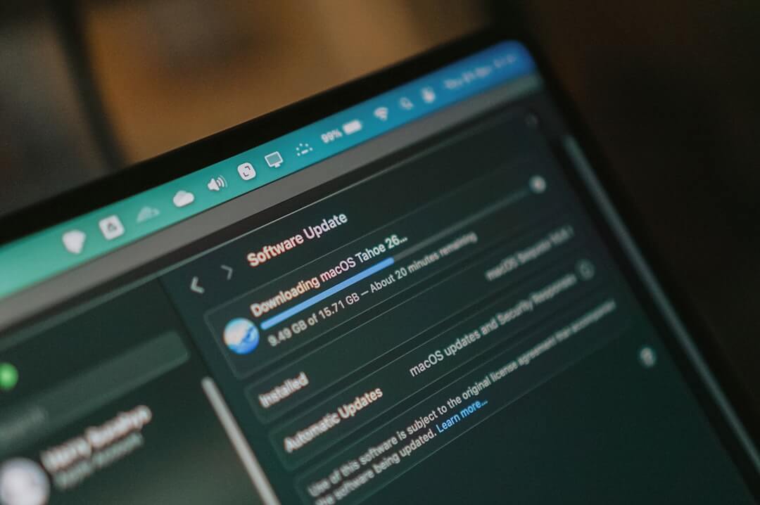 Macbook screen shows macos software update downloading