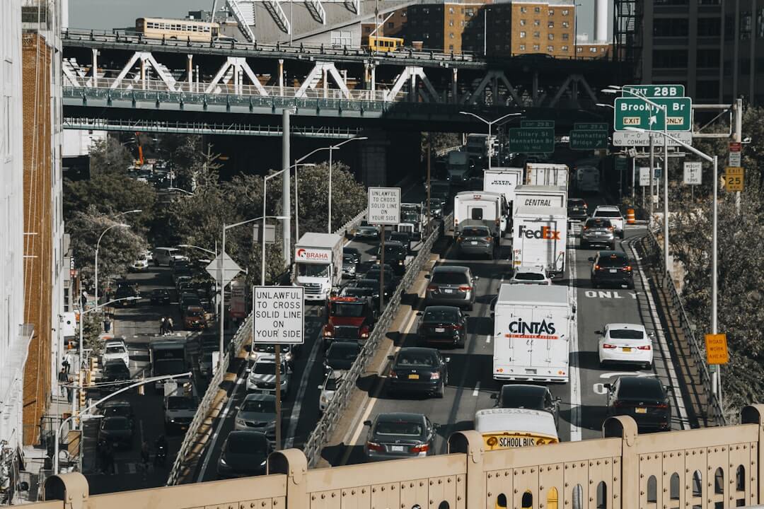 a bunch of cars that are in the street