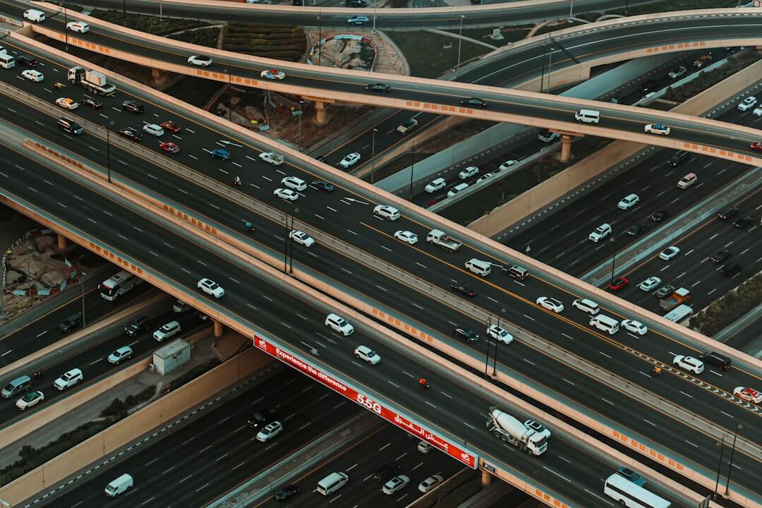 Busy highway interchange with traffic at dusk