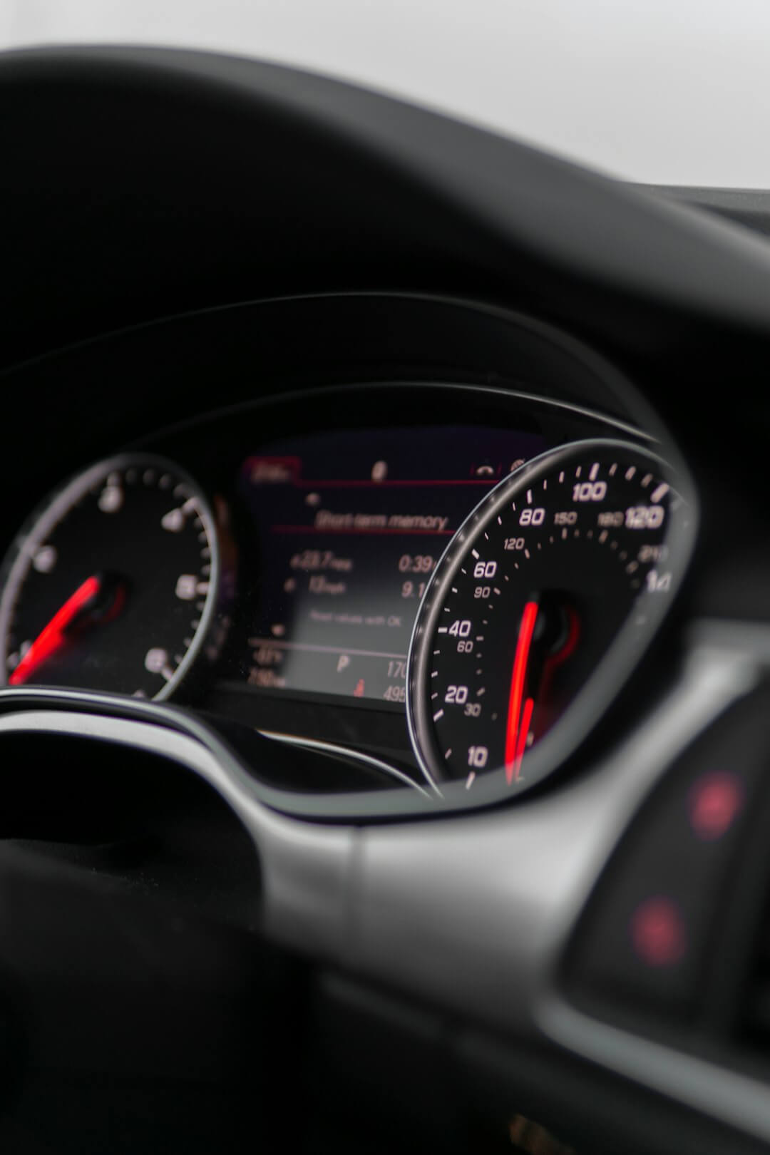 the dashboard of a car with speedometers and gauges