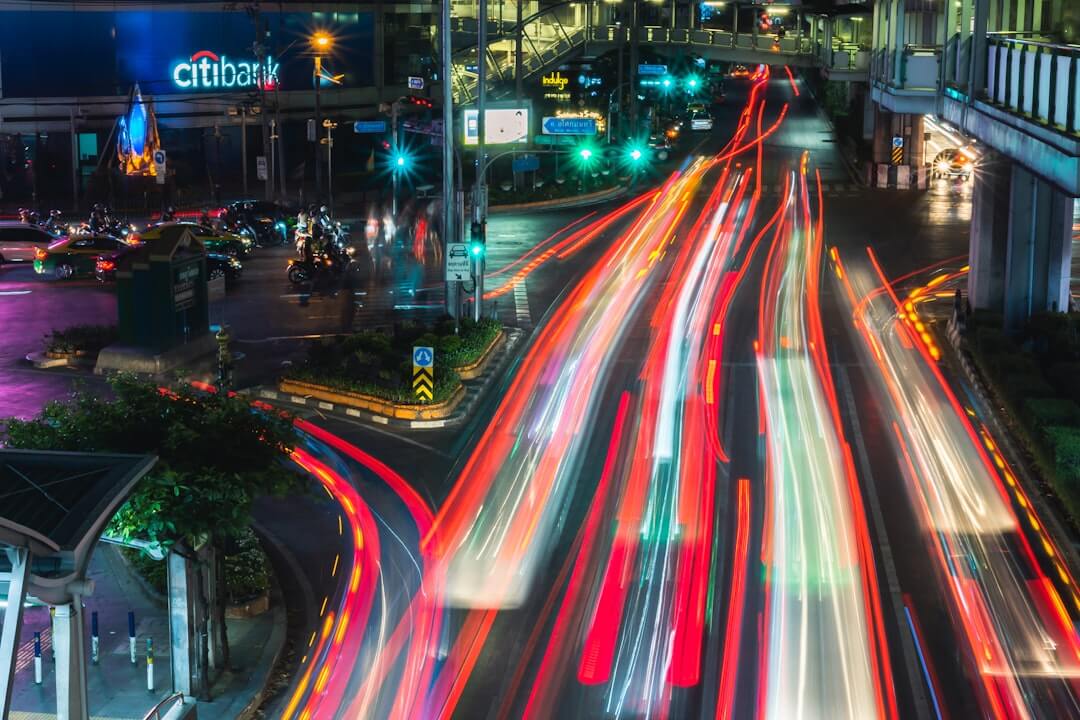 time lapse photography of cars on road during night time