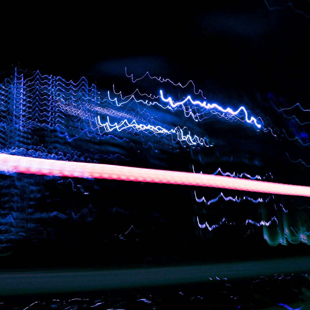 Abstract streaks of blue and red light at night