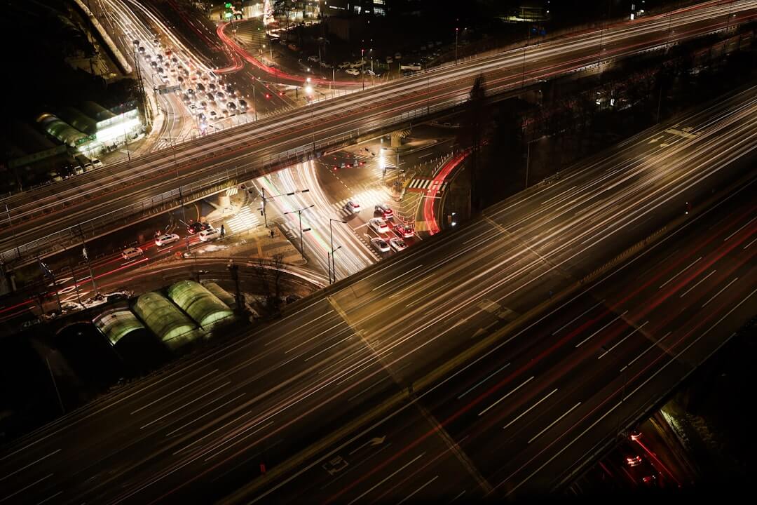 an aerial view of a city street at night
