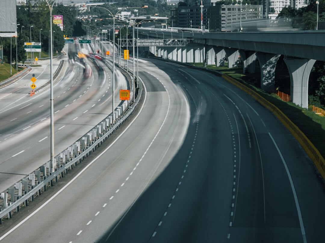 Highways are busy with the blurred streaks of cars