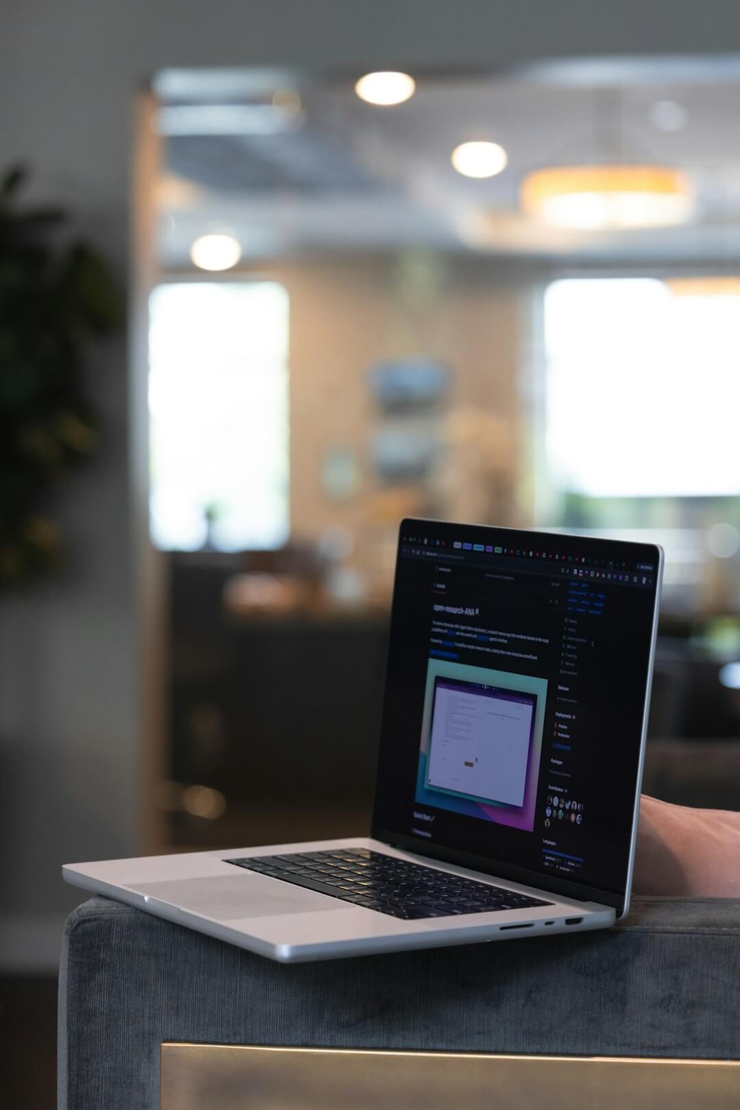 Open laptop showing programming code on a screen