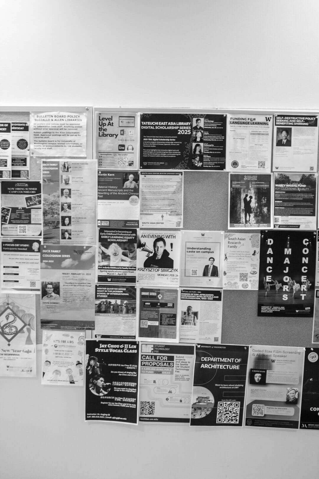 Bulletin board covered with announcements and flyers